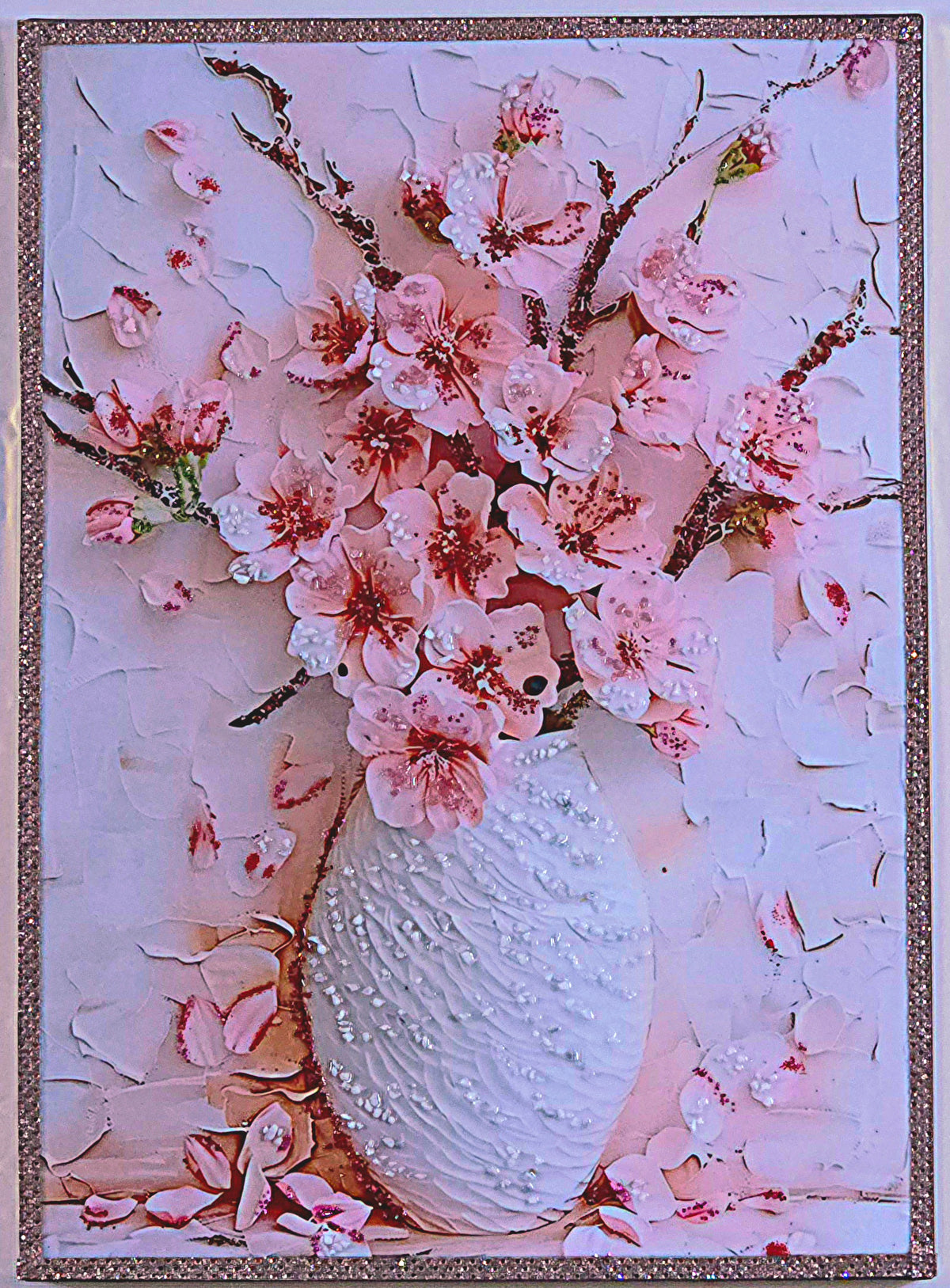 Blush Peony Vase shown under warmer lighting, where the blush tones soften and the gold and reflective details become more pronounced.