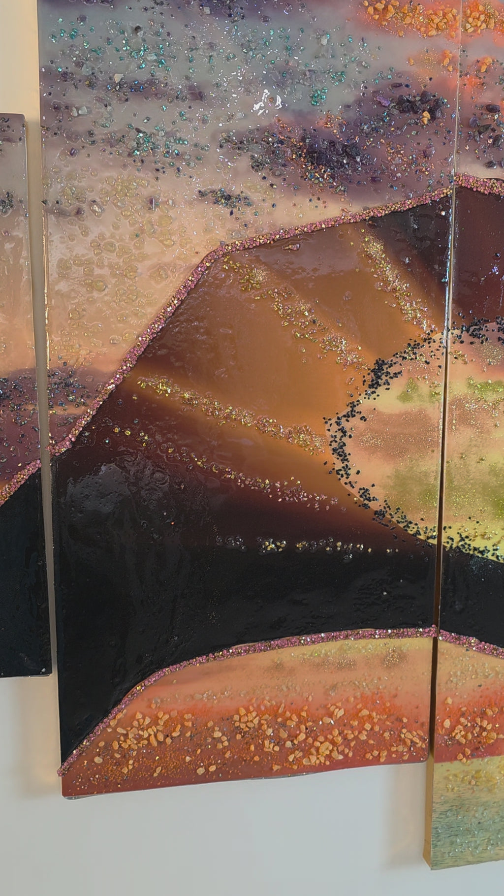 Detail video of panel 4 of Sunset in Our Hands, shown in balanced neutral lighting with its colours, texture and handcrafted embellishments.