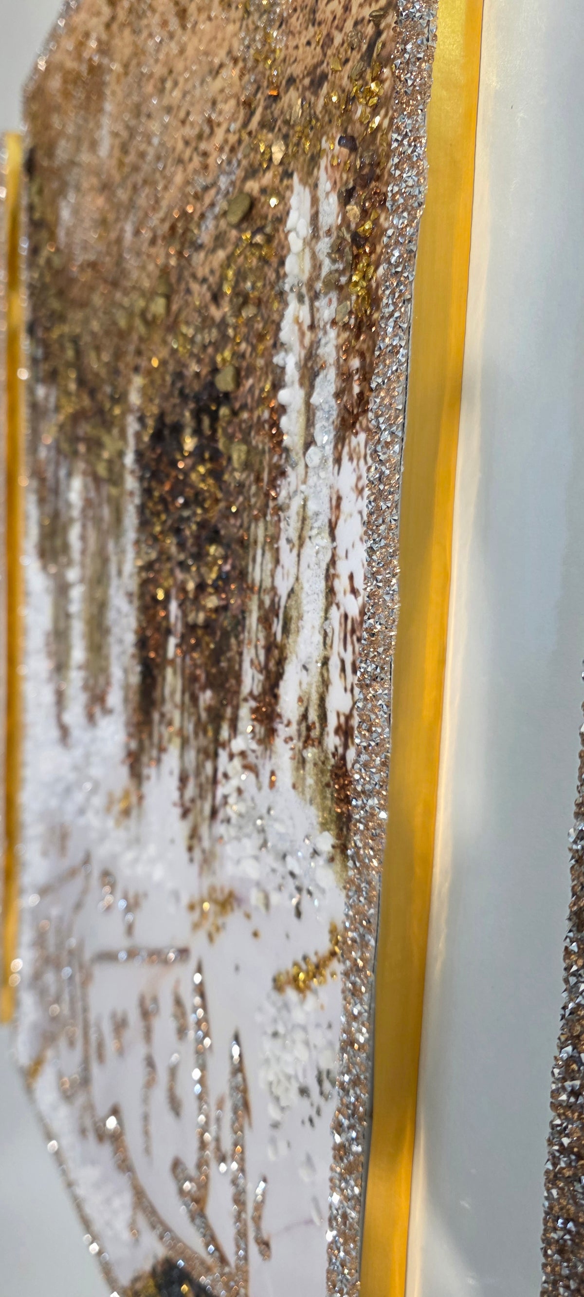 Three-panel Tasabeeh Collection I wall art with hand-applied crystals, stones and crushed glass enhancing the original design.